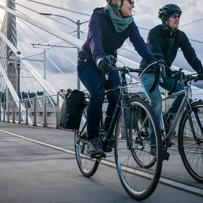 cyclists on a pedestrian bridge