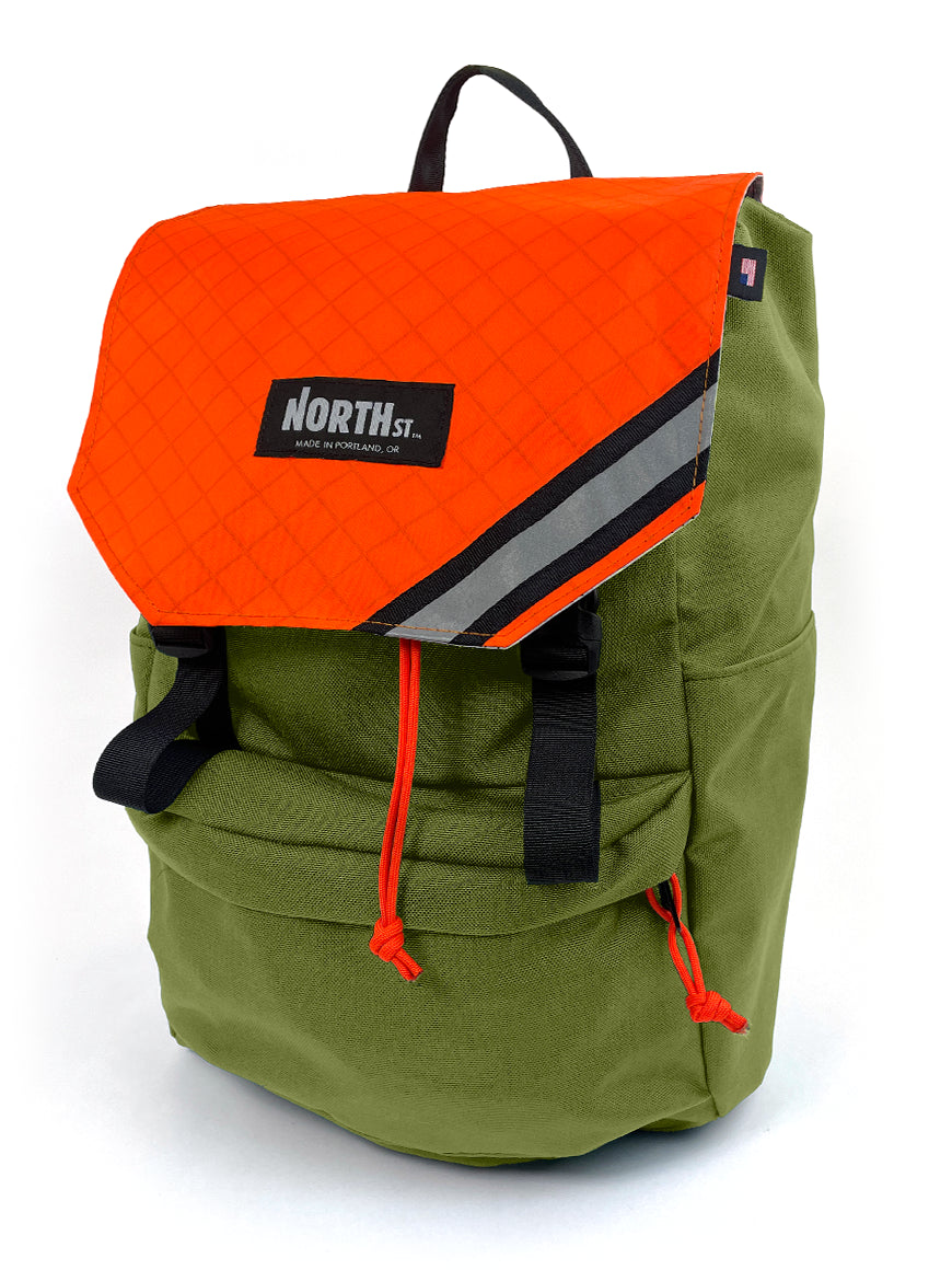 Front view of Belmont Backpack 22L in moss green and orange - North St. Bags
