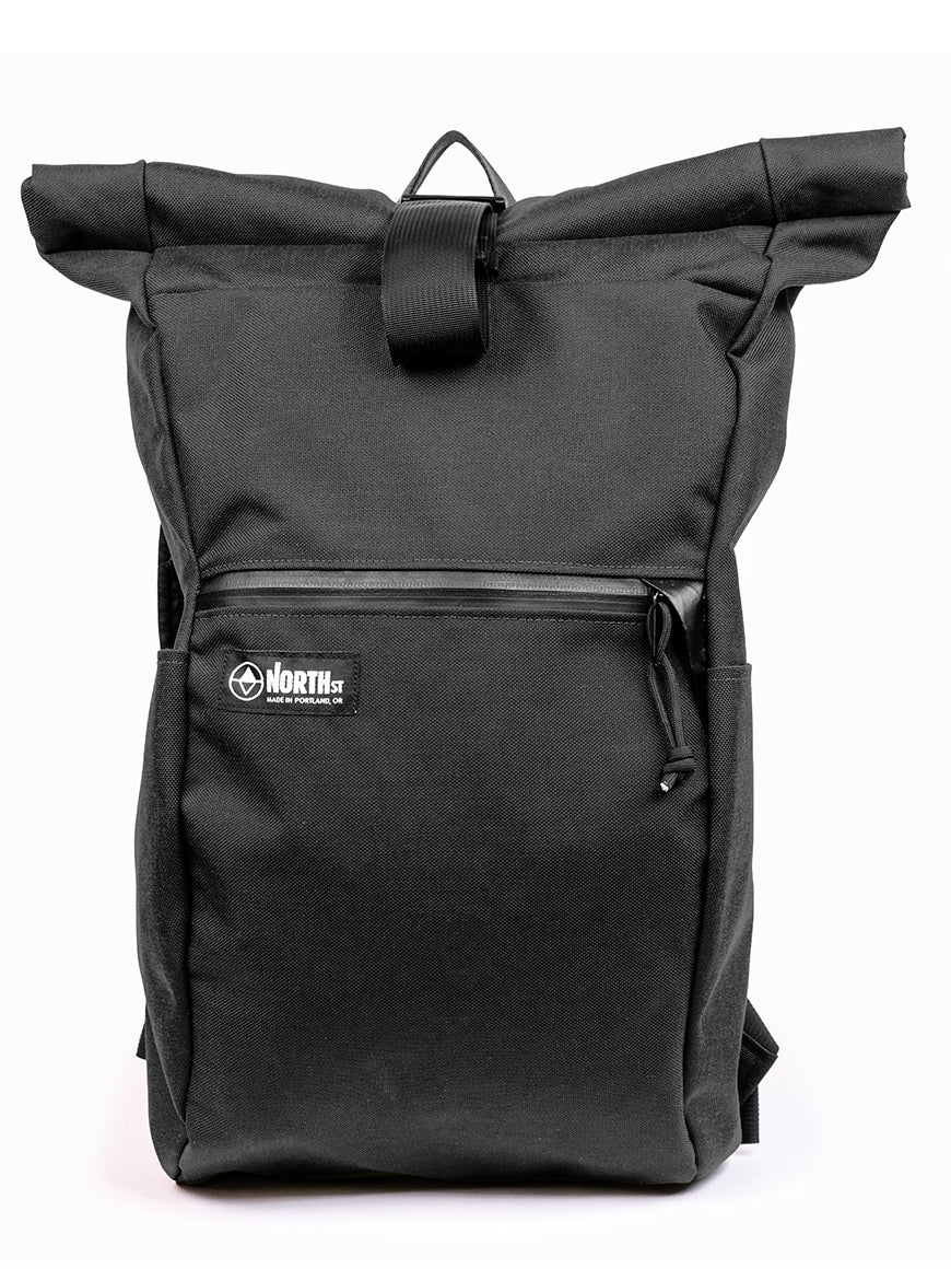 Black roll-top backpack with a visible brand logo on a white background