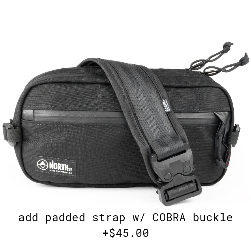 front view of sling pack with padded strap by North St in black