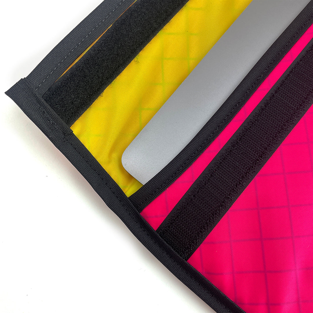 Detail of laptop sleeve showing flap and velcro