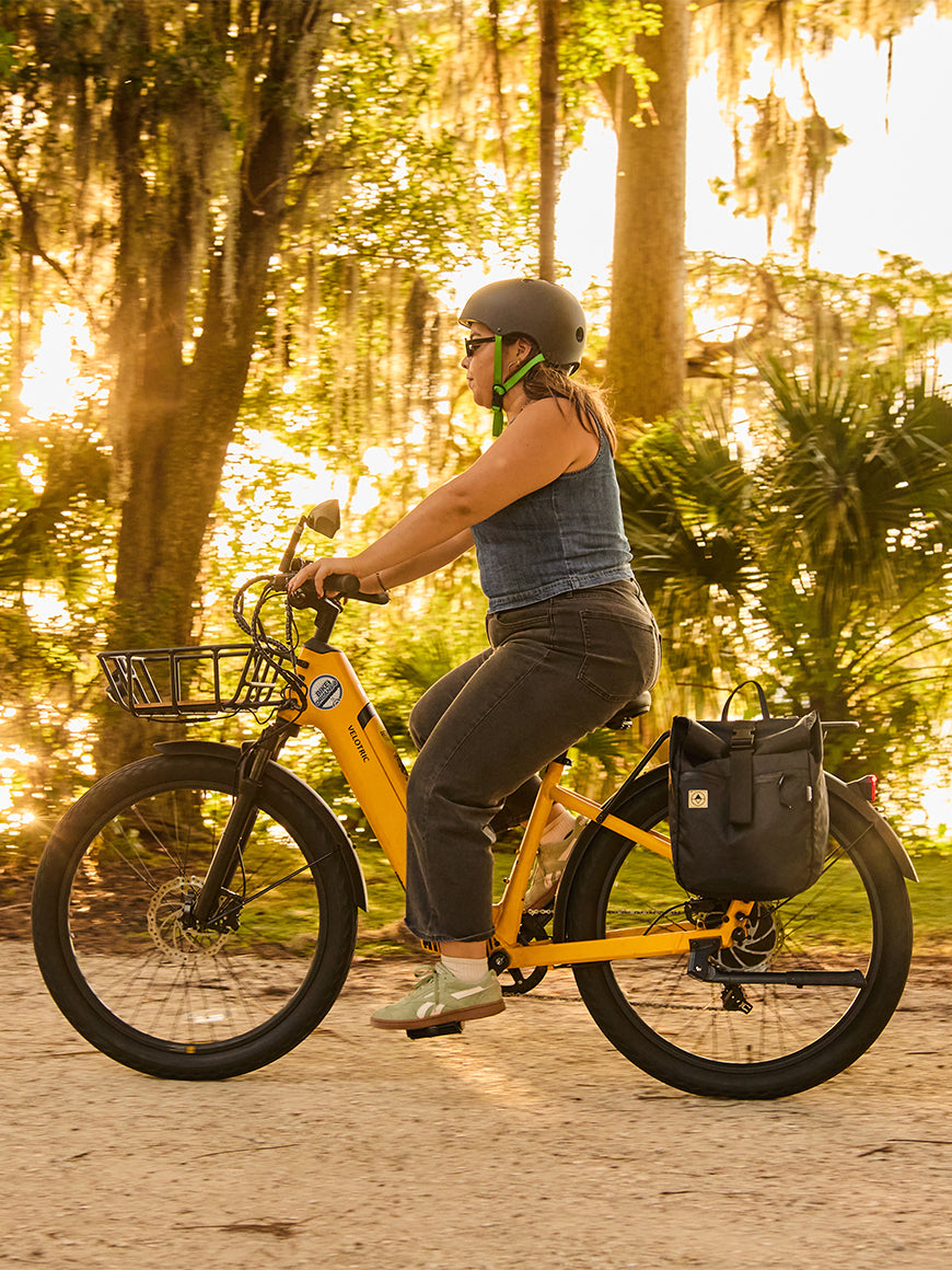 female bike rider with black pannier all-groups