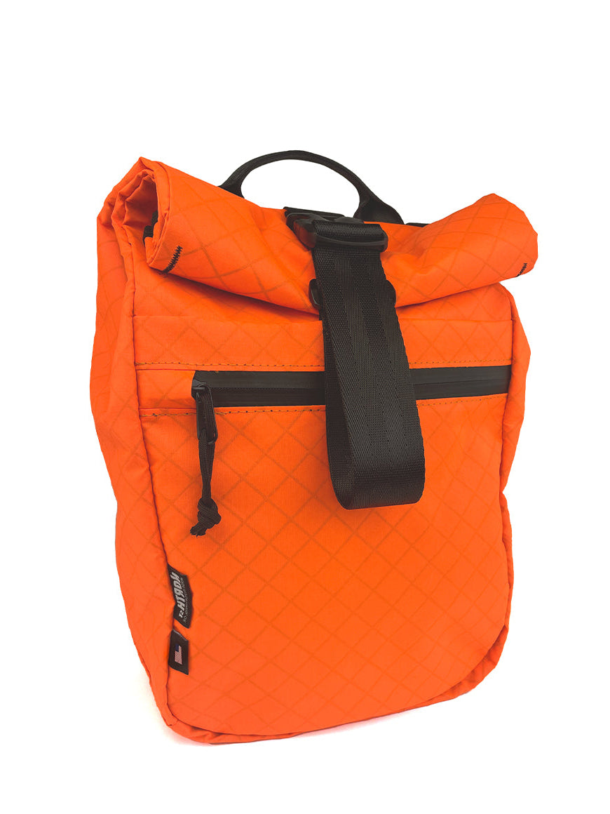 Front view of Commuter Micro Pannier 14L in blaze orange. - North St. Bags