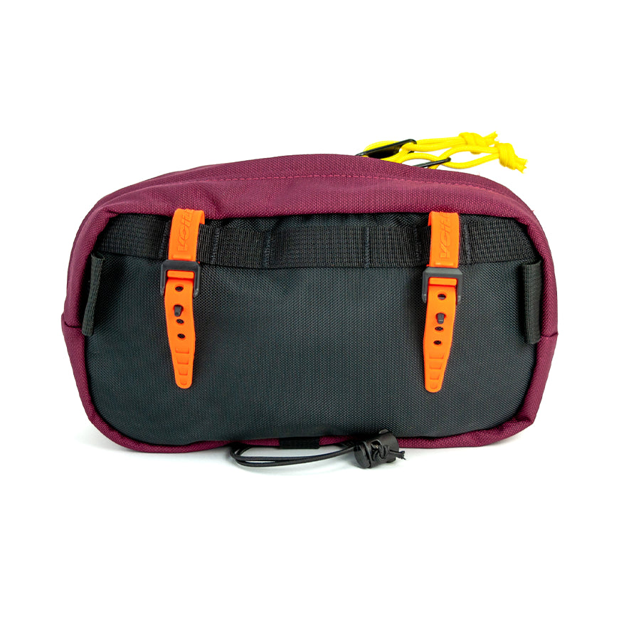 Multicolored pouch with orange straps on a white background