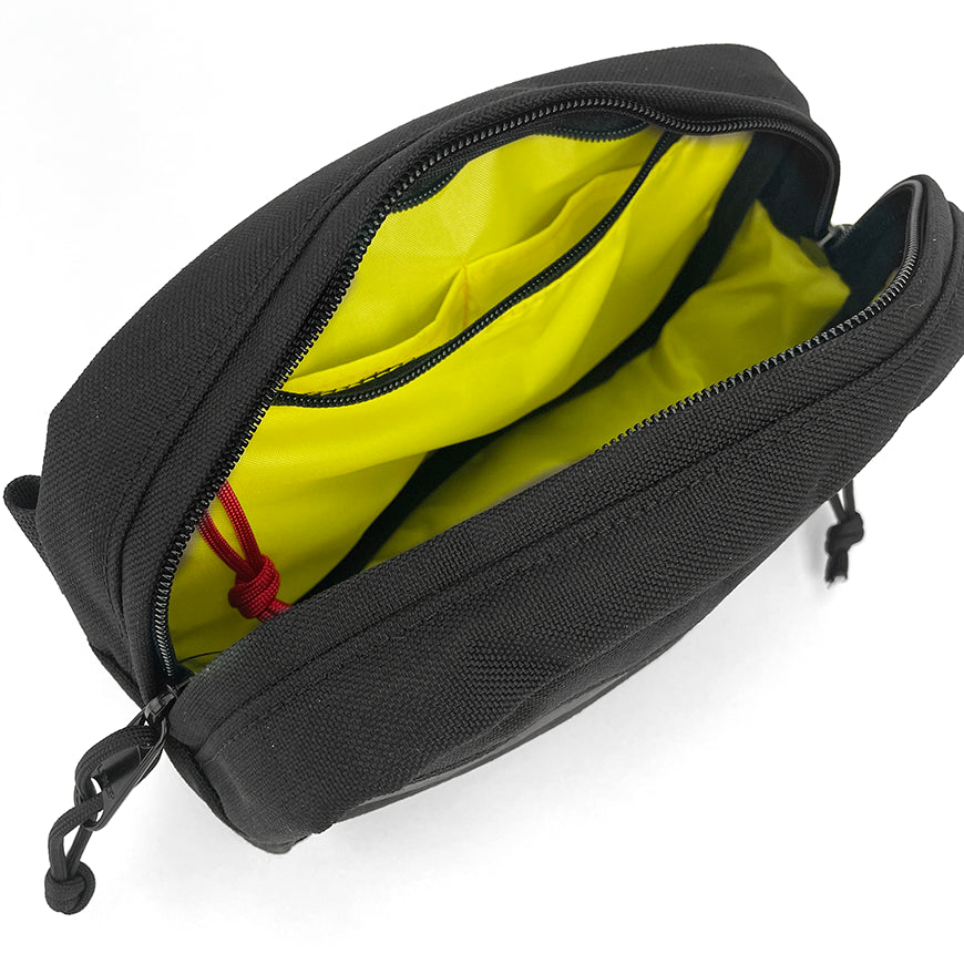 Black bag with yellow interior on a white background