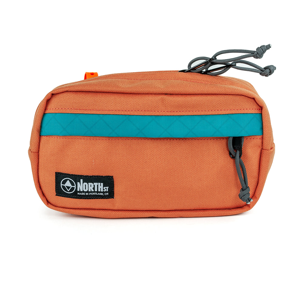 pioneer 9 handlebar pack on a white background in burnt orange from North St Bags