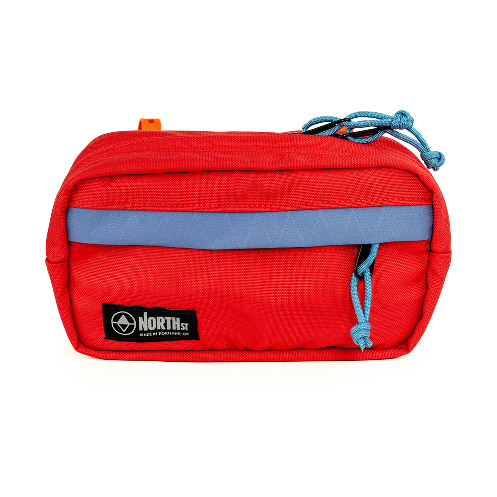 Front view of Pioneer 9 Handlebar Pack in Orange & Blue