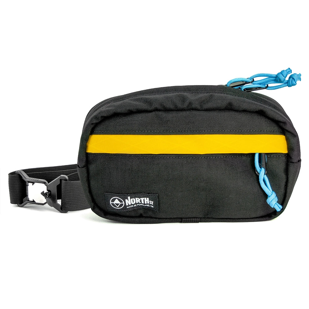 pioneer 9 hip pack in black with gold accent and north st label