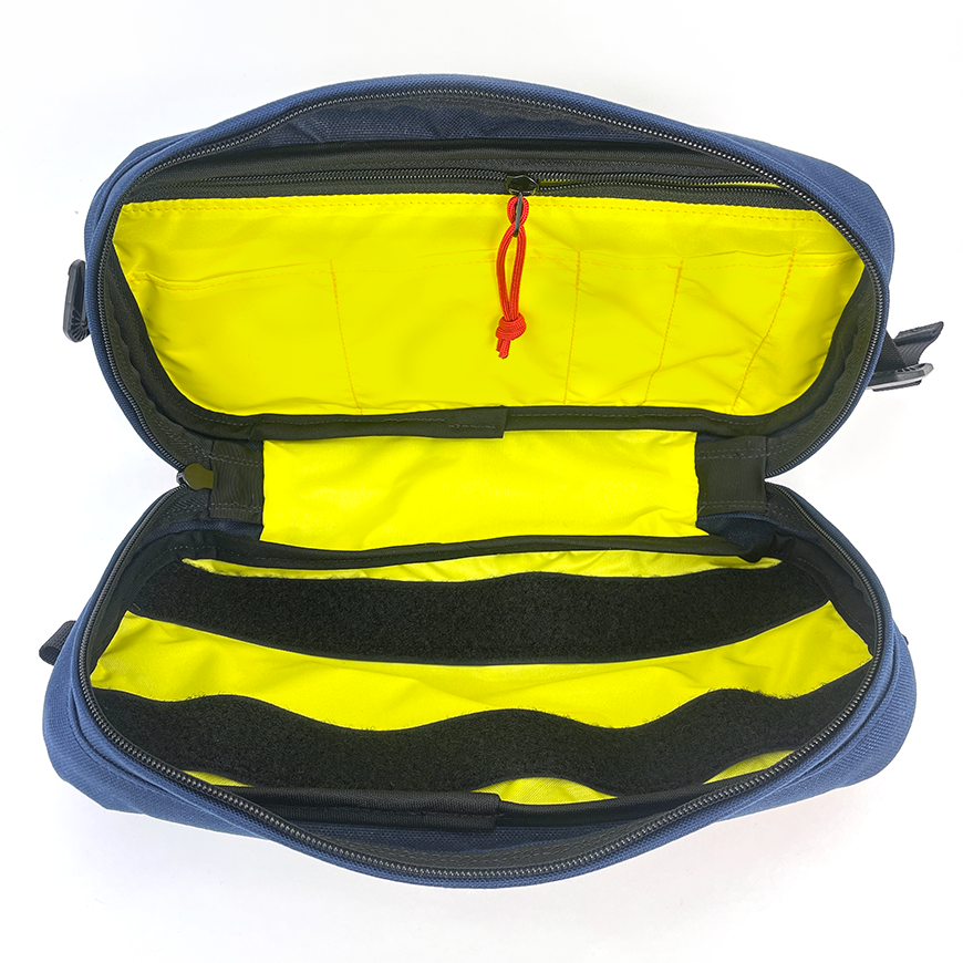 Detail interior shot of Eliot Sling Pack showing inner pockets and sleeves - all-groups