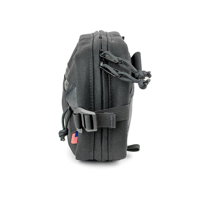 side view of sling pack by North St in black