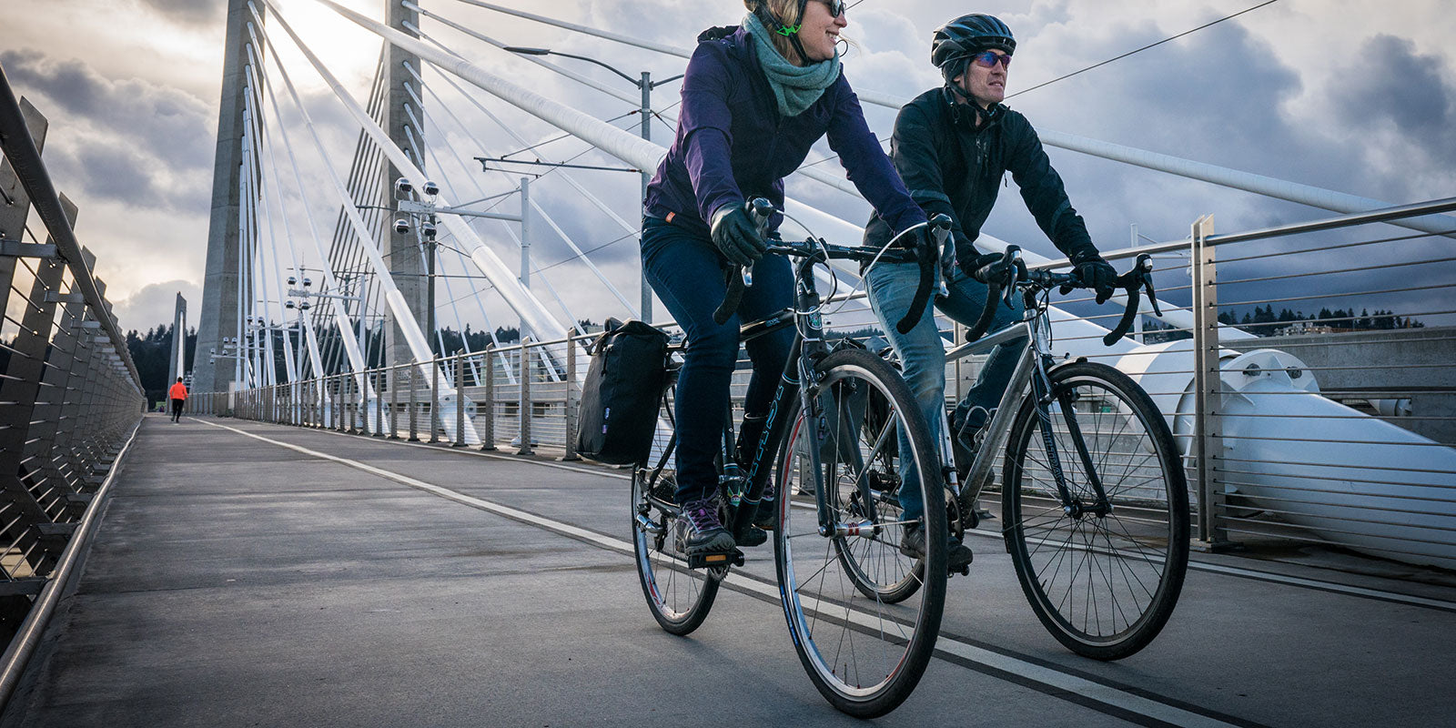 cyclists on a pedestrian bridge