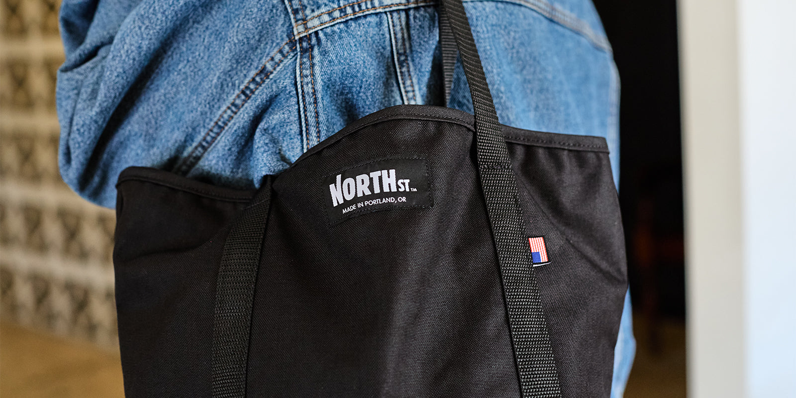 closeup of woman wearing a tote over the shoudler