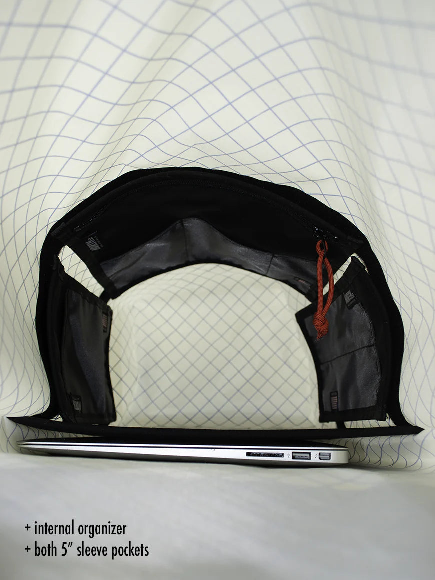 Interior view of Morrison Backpack Pannier showing white liner with hook and loop pockets installed.- North St. Bags all-groups