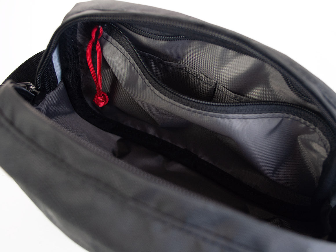 Interior view of Pioneer 9 Handlebar Pack in black with a gray liner - North St. Bags all-groups