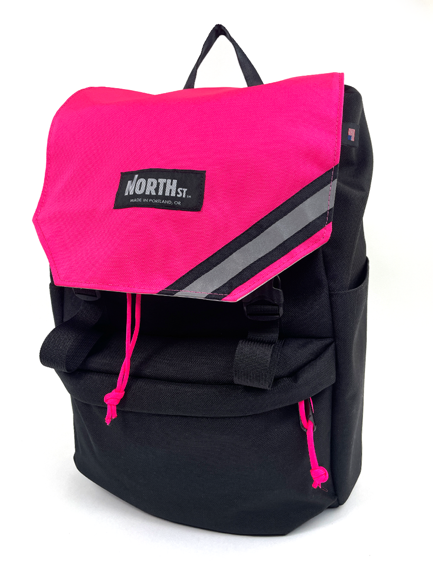Front view of stylish backpack pannier in Black & Hot Pink. Morrison Backpack Pannier 22L - North St. Bags