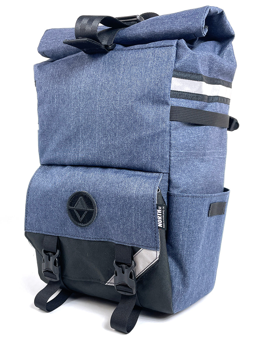 Front view of limited Woodward Backpack Pannier in blue denim. - North St Bags