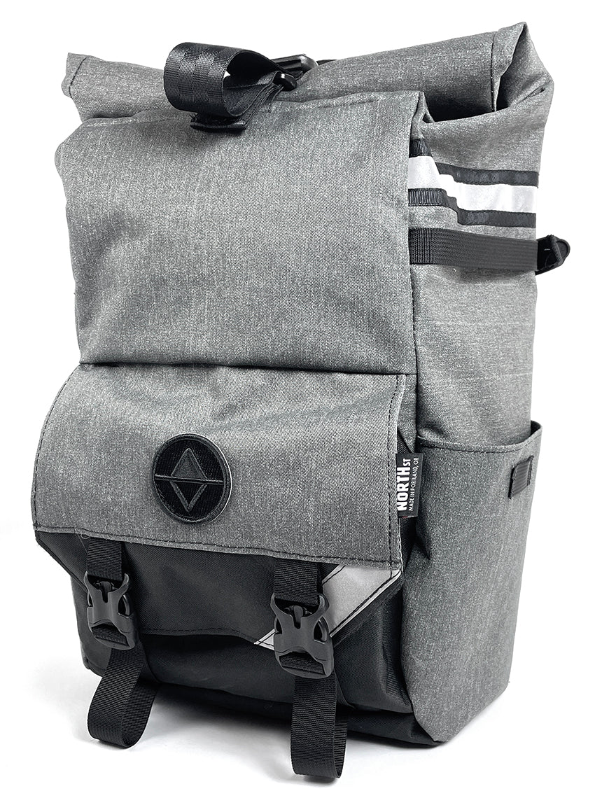 Front view of limited Woodward Backpack Pannier in gray denim. - North St Bags