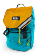 Front view of stylish backpack pannier in teal and gold. Morrison Backpack Pannier 22L - North St. Bags
