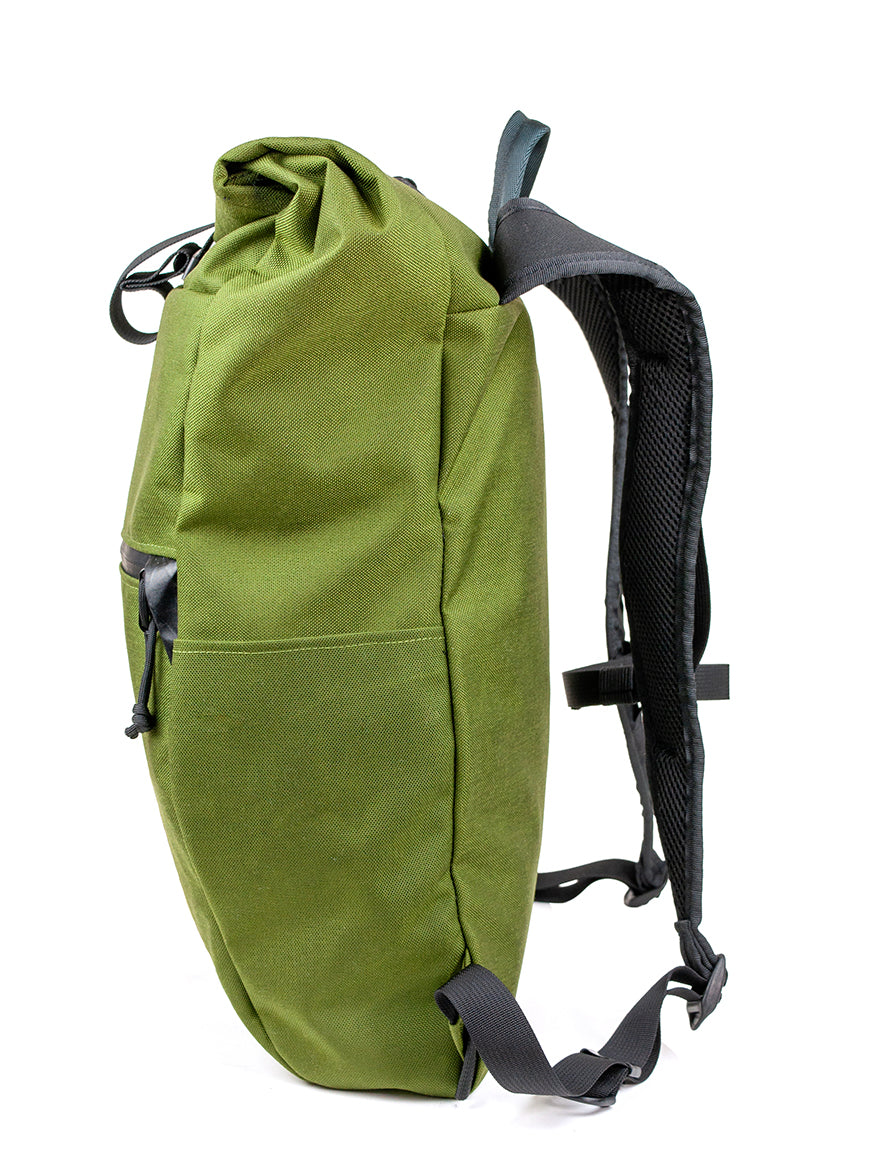 Green backpack with black straps on a white background all-groups