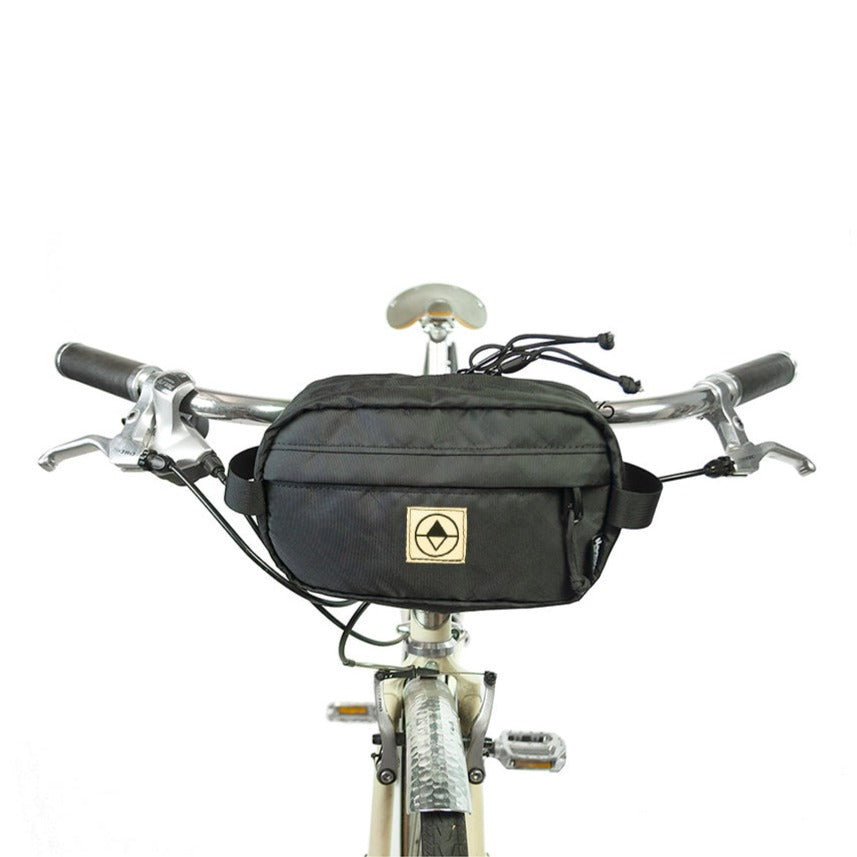 Pioneer 9 Handlebar Pack in black mounted to bicycle - North St. Bags