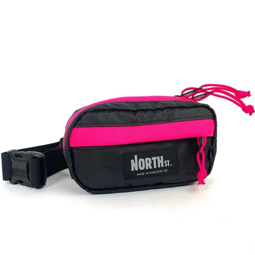 Front view of Pioneer 8 Hip Pack in Black and Hot Pink - North St. Bags