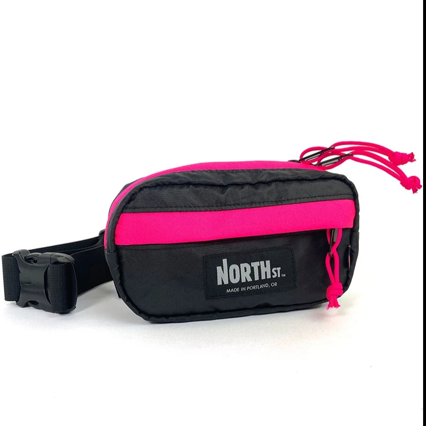 Front view of Pioneer 8 Hip Pack in Black and Hot Pink - North St. Bags