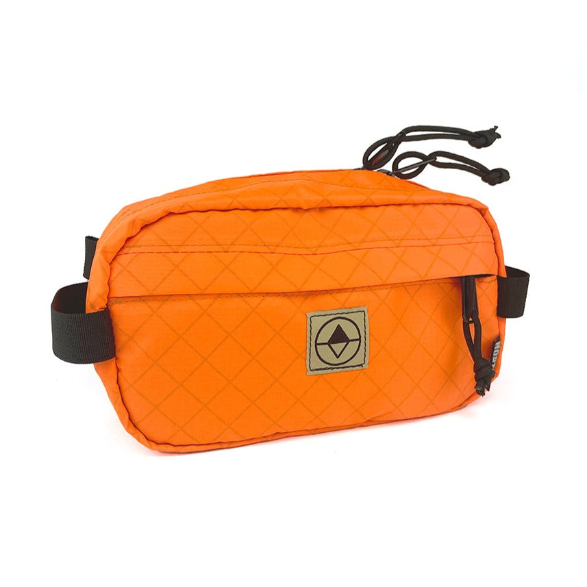 Front view of Pioneer 9 Hip Pack in EPX Blaze Orange - North St. Bags