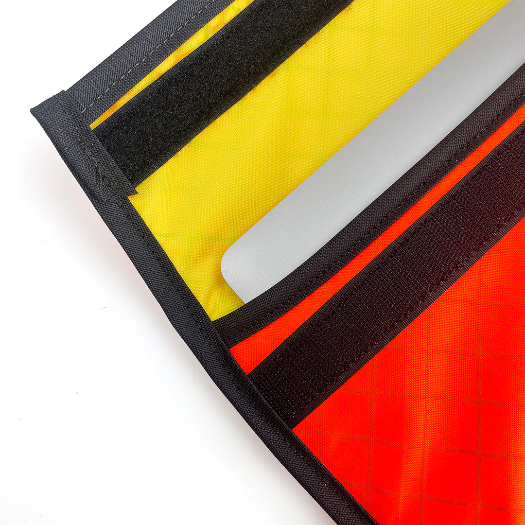 Detail of laptop sleeve showing flap and velcro
