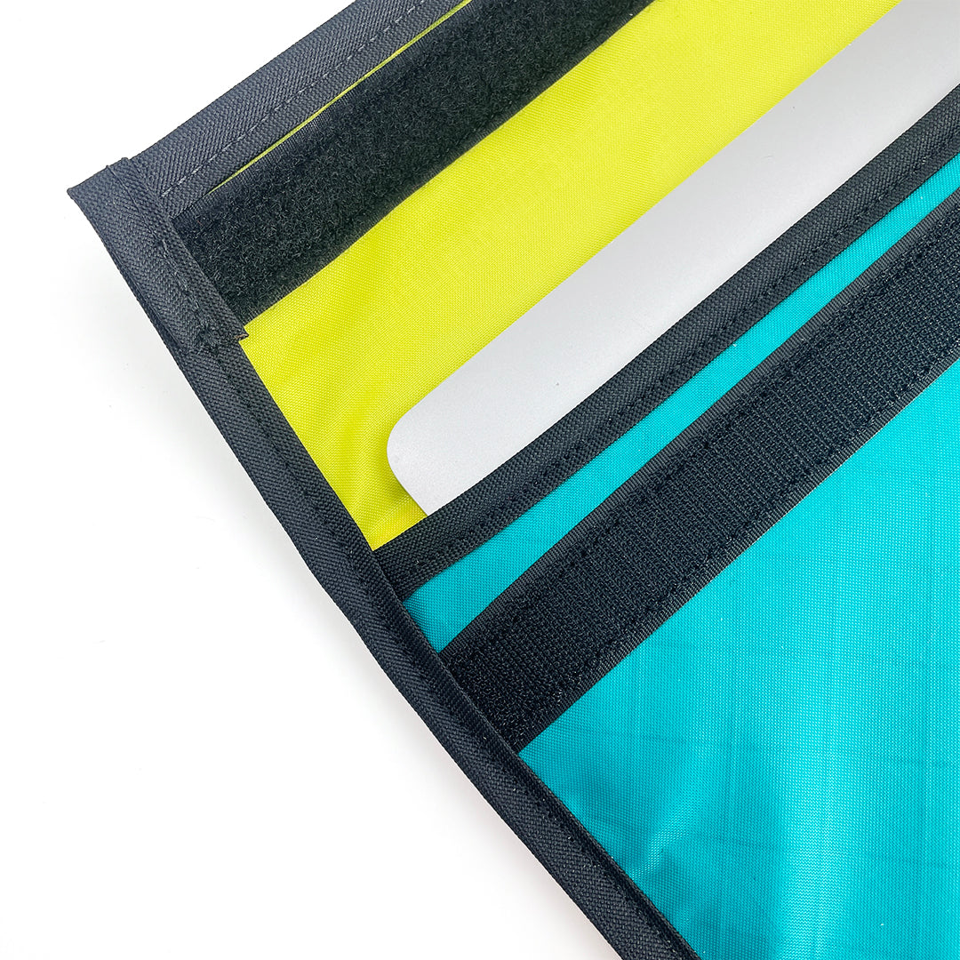 Detail of laptop sleeve showing flap and velcro