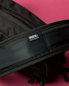 Detail view of padded sling strap all-groups