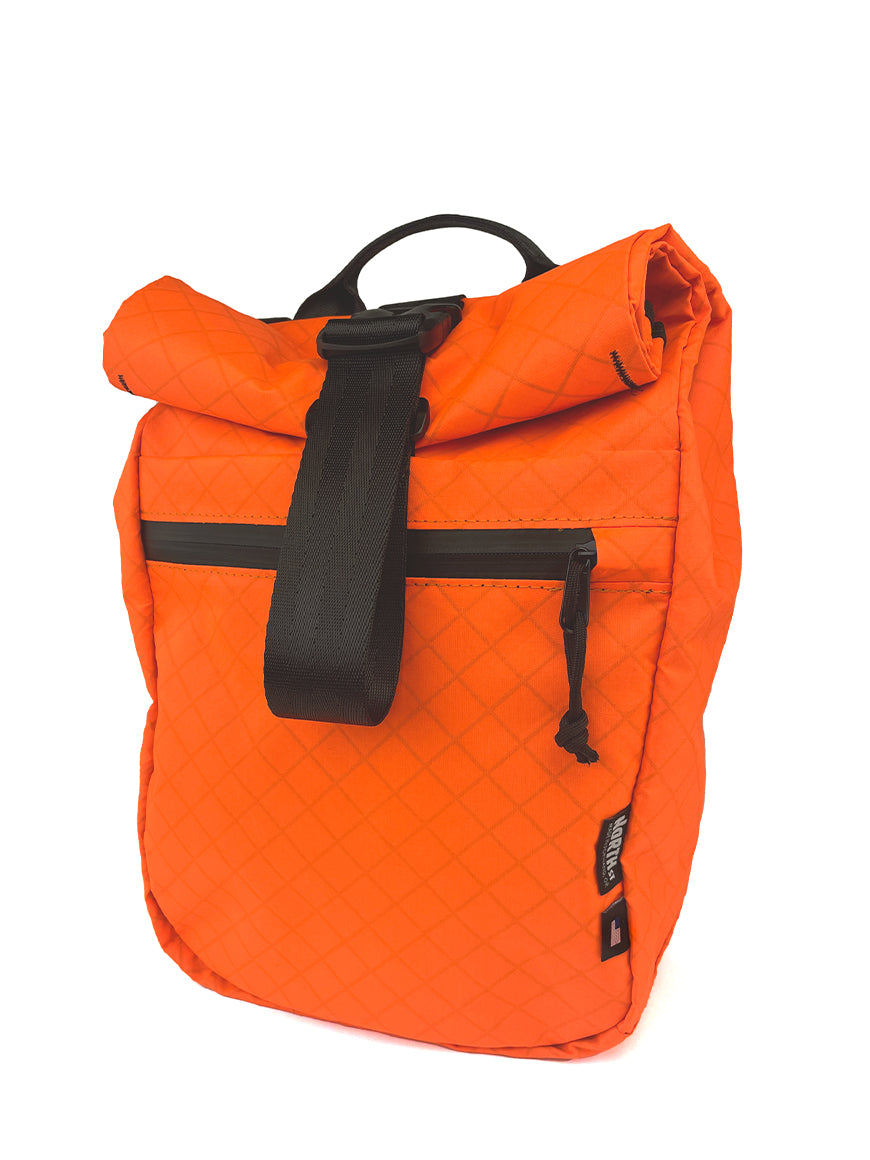 Front view of Commuter Micro Pannier 14L in blaze orange. - North St. Bags