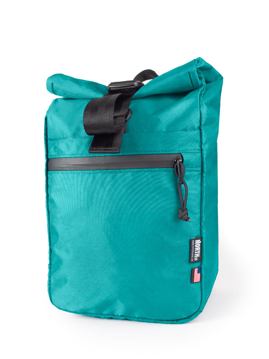 Front view of Commuter Micro Pannier 14L in teal. - North St. Bags