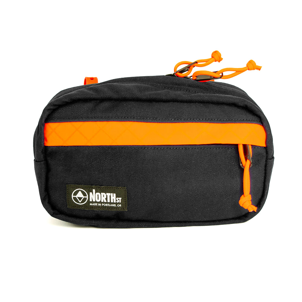 Front view of Pioneer 9 Handlebar Pack in Black and Orange