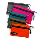 Set of colorful pouches with a brand logo on a white background all-groups
