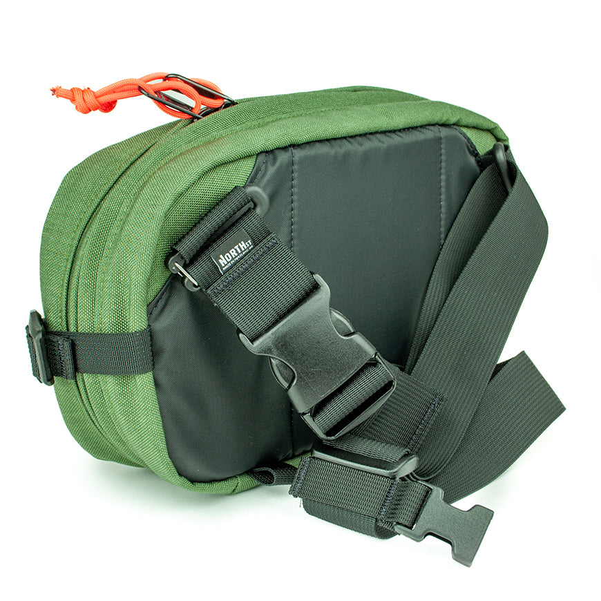 detail view of sling pack by North St showing back and strap