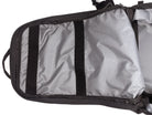 Close-up of the interior of a black and gray backpack, showing a gray liner with two black vertical velcro rows and black zipper trim.