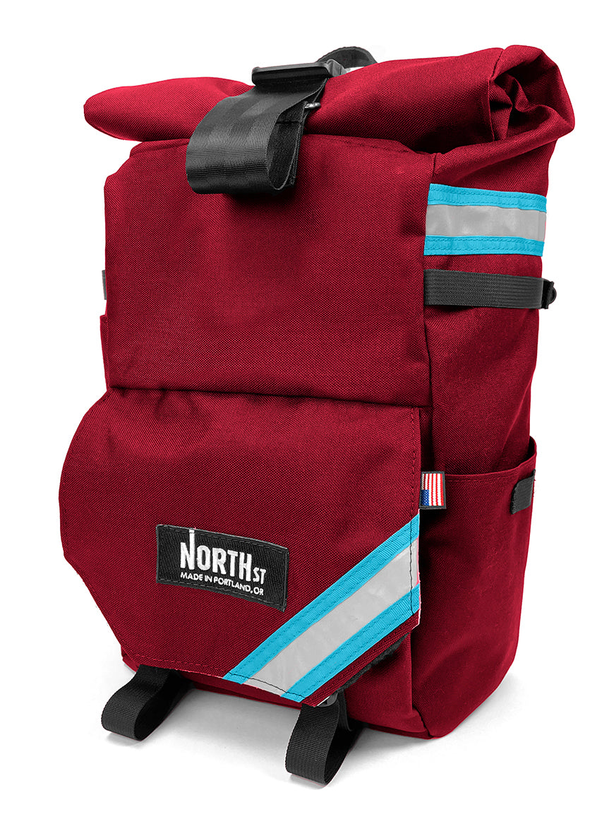 front view of woodward backpack pannier in burgundy and blue - North St Bags