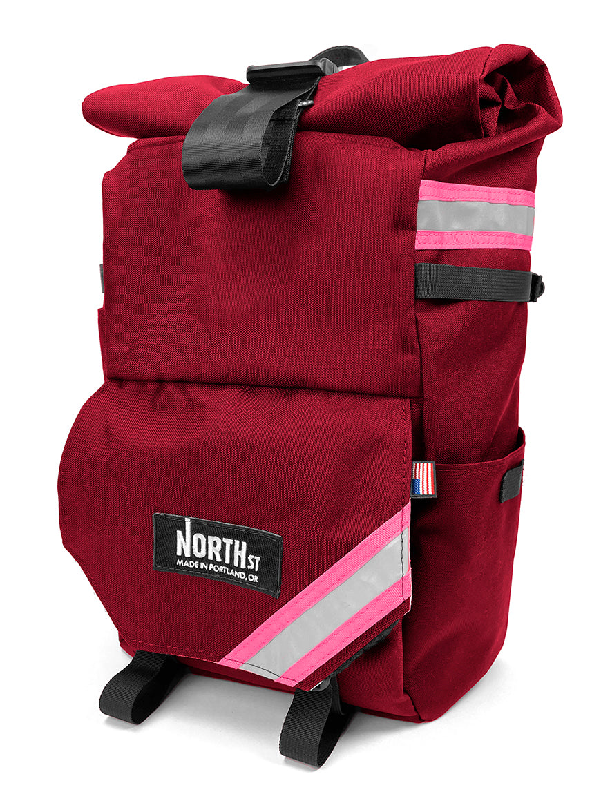 front view of woodward backpack pannier in burgundy and pink - North St Bags