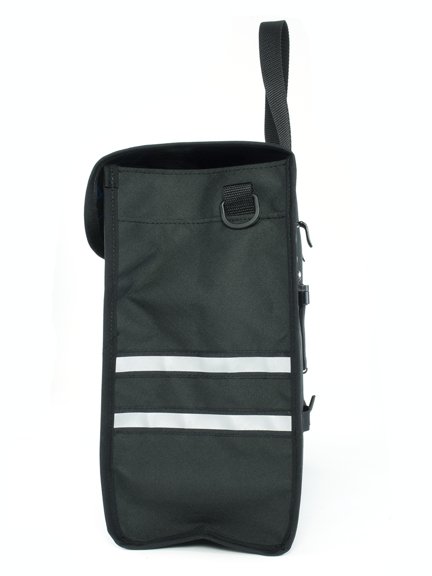 Side view of grocery pannier in black showing d-ring tab and reflectors. - North St. Bags all-groups
