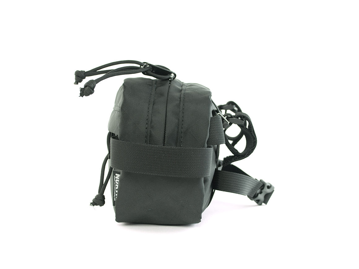 Side view of Pioneer 9 Handlebar Pack in black, showing handlebar straps installed. - North St. Bags all-groups